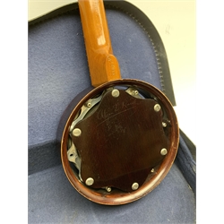 Early 20th century Keech Banjulele banjo, the ebonised back with etched 'signature' Alvin D. Keech, serial no.A12013, pat.219720/23, maker's metal plaque 55cm overall, in simulated reptile skin carrying case