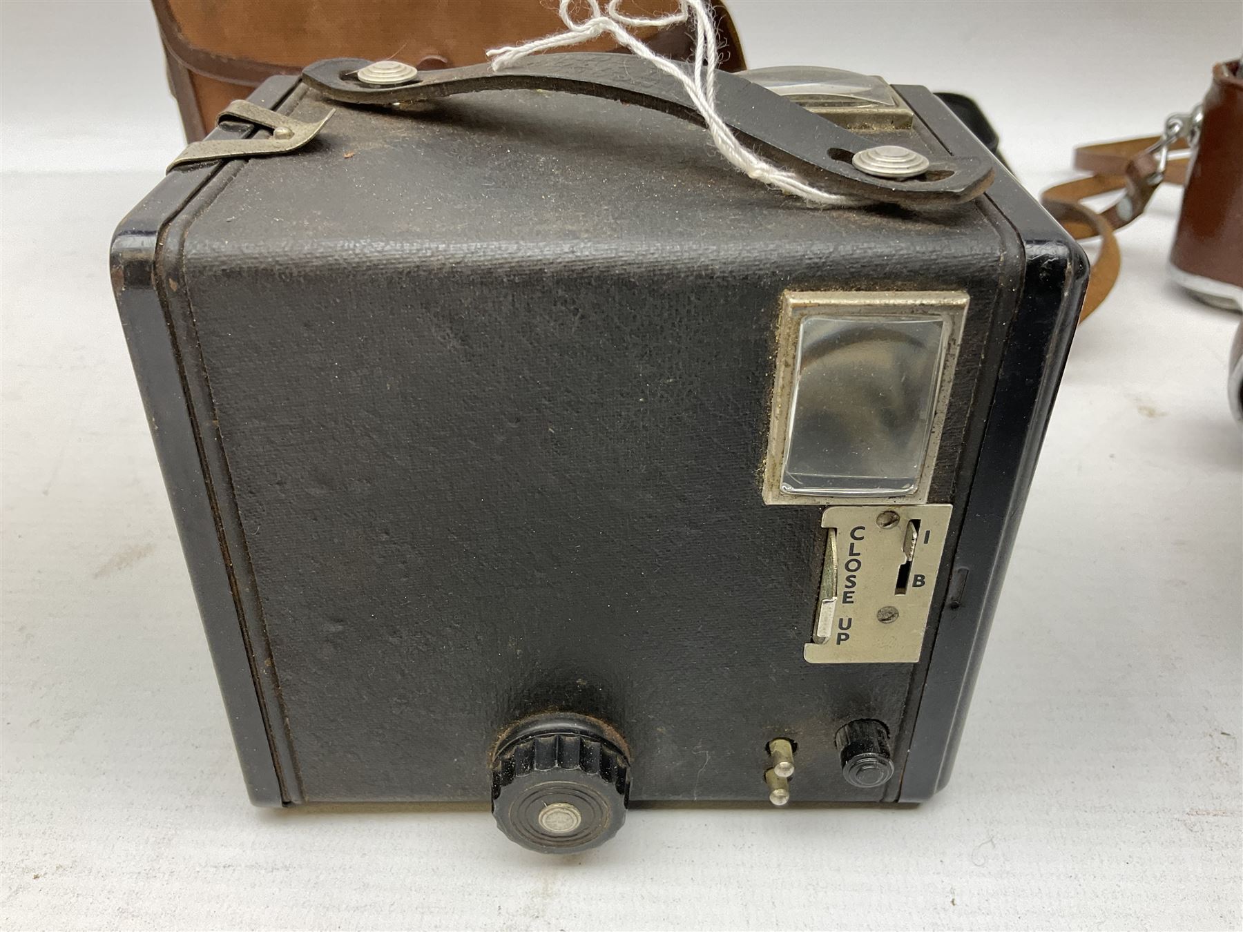 Kodak Retina III camera with 'Schneider-Kreuznach 3977724 Retina-Xenon C f:2/50mm' lens in leather case, and Brownie Model D in leather case