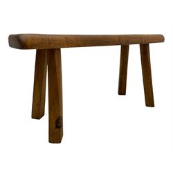 'Gnomeman' oak side table, shaped adzed top on tapered supports, carved with gnome signature, by Thomas Whittaker of Littlebeck