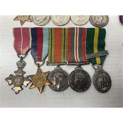 Three miniature groups of five medals - OBE Military group with WW1 trio and Italy Order of Saints Maurice & Lazarus Knights Cross; MBE Military group with WW2 trio and Territorial Efficiency Decoration; and WW2 trio, General Service Medal 1918-62 with Brunei and Arabian Peninsula clasps and GSM 1962 with Borneo clasp; all with ribbons on pinned wearing bars (3)