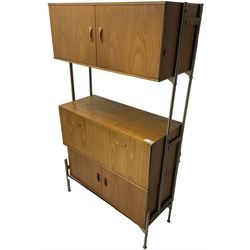Remploy - mid-20th century teak sectional wall display unit or room divider, raised double cupboard section, central fall front section, and lower double cupboard section