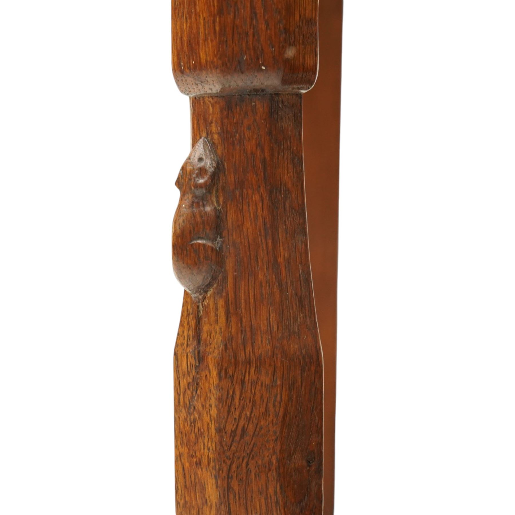 Mouseman side chair- panelled adzed back over tan leather upholstered seat with studwork, on octagonal front supports united by stretchers, each with signature carved mouse, by the workshop of Robert Thompson, Kilburn