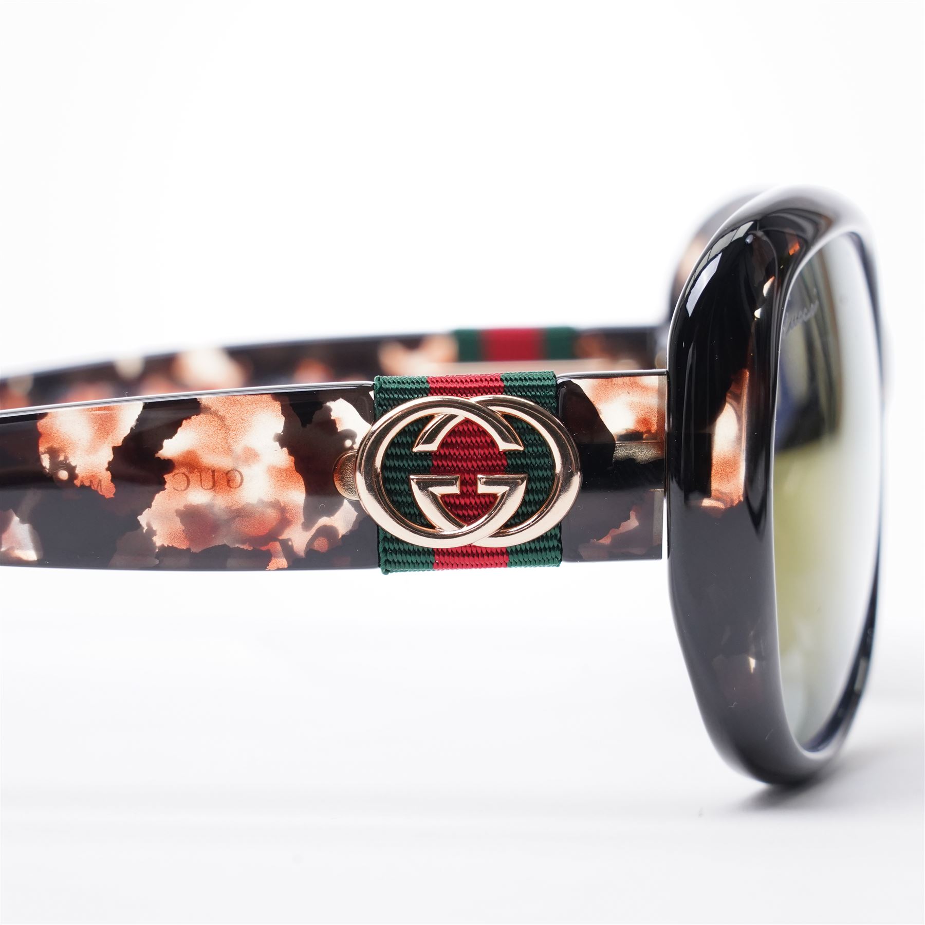 Gucci - pair of oversized sunglasses, with graduated mirrored lenses in tortoiseshell-effect frame, the arms with signature web stripe and interlocking gold-tone GG logo, unused with original monogram leather case 
