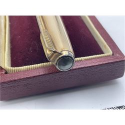 Three rolled gold Parker fountain pens, comprising an example with a gold nib marked 14K 585 and barrel with a shell stamp, a Parker 61 fountain pen with inset gold arrow to the nib, and another similar, all with striated decoration and arrow clips to the caps, L13cm, one with box