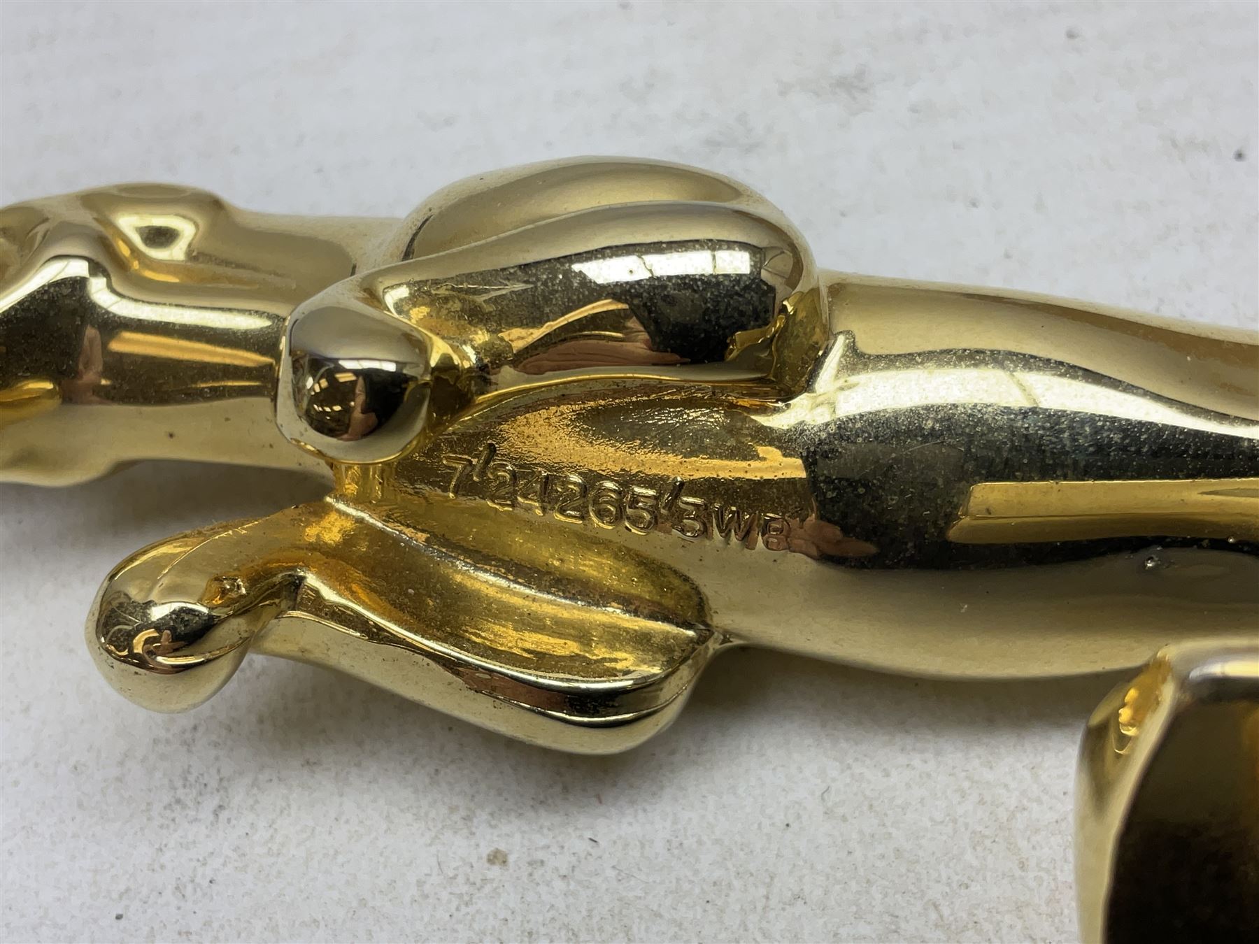 Gold plated leaping Jaguar car mascot, no.7'24265'3WB L12.5cm; three AA car badges and Veteran Motorists car badge; and quantity of 1950s fuel and general ration books