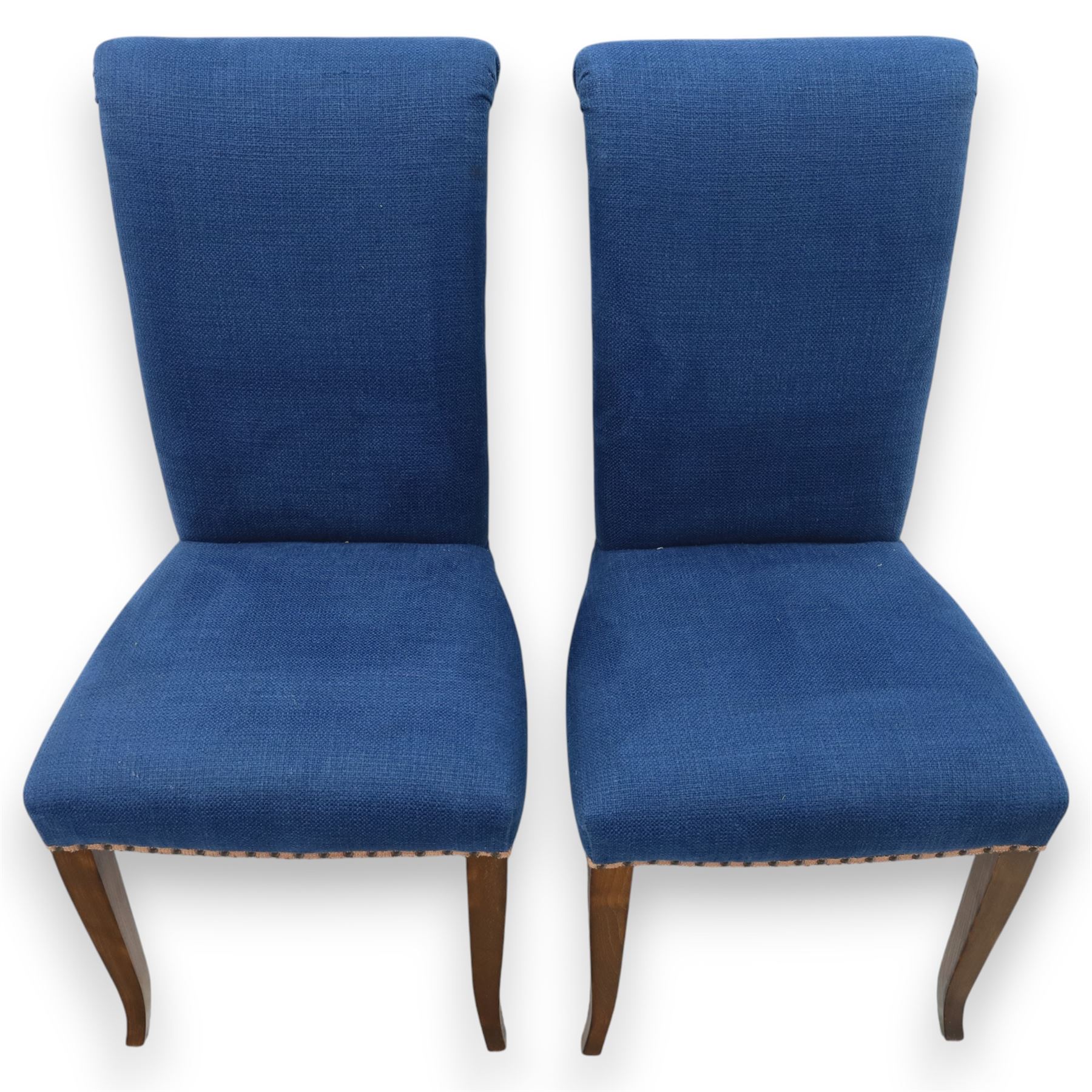 Contemporary set of four blue high back upholstered dining chairs