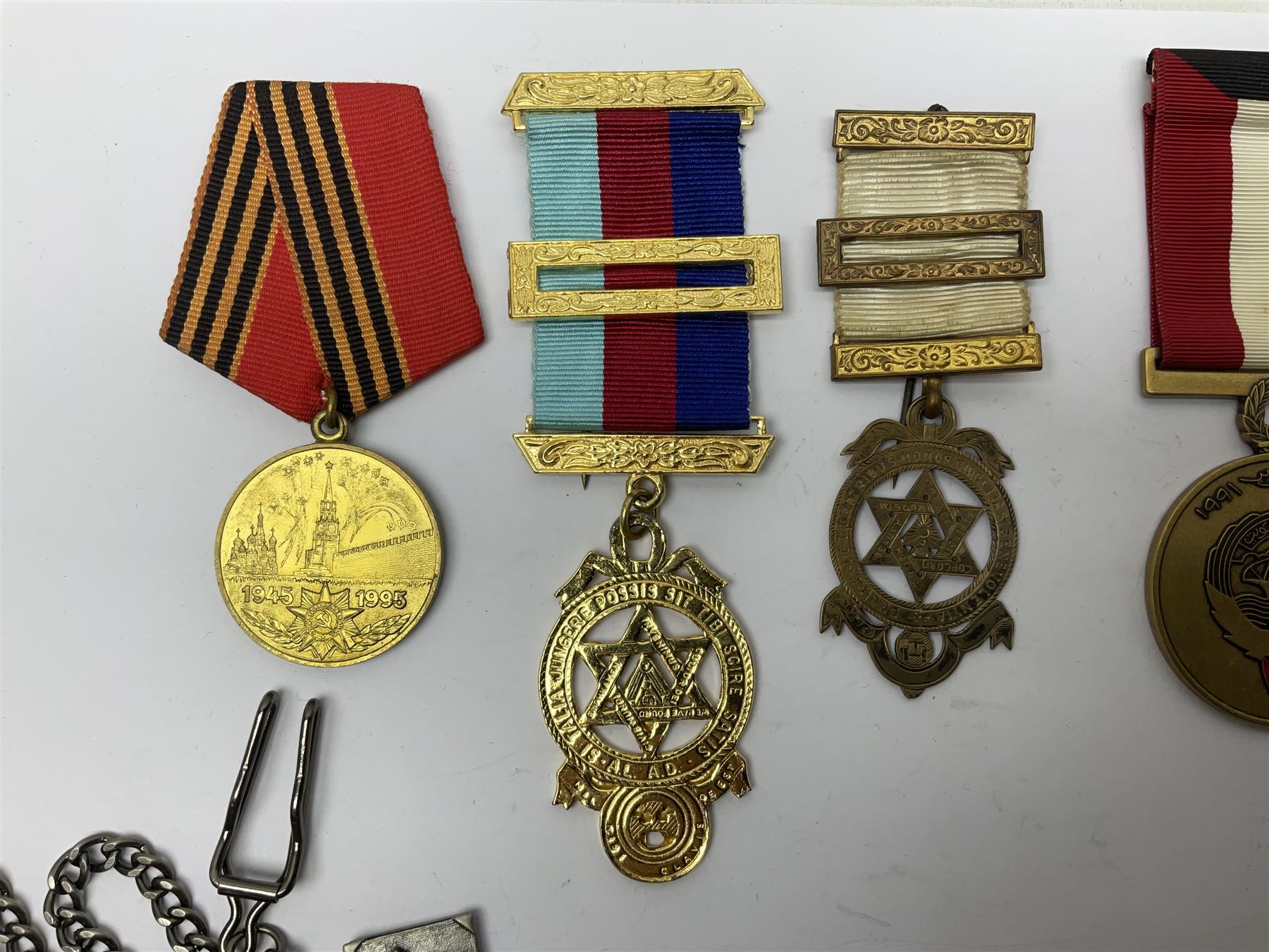 RAOB jewel Bourn Lodge 9394 with 25 years bar; two masonic jewels and triangular pendant watch; British Iron Cross style propaganda medallion; French Legion of Honour and Combatants Cross; and three foreign medals