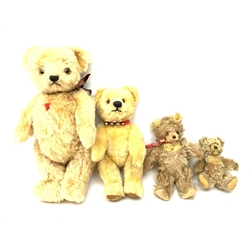  A group of four teddy bears, to include a small Steiff example with button to ear, and a Chad Valley example with label to foot, each with jointed limbs and glass eyes.   