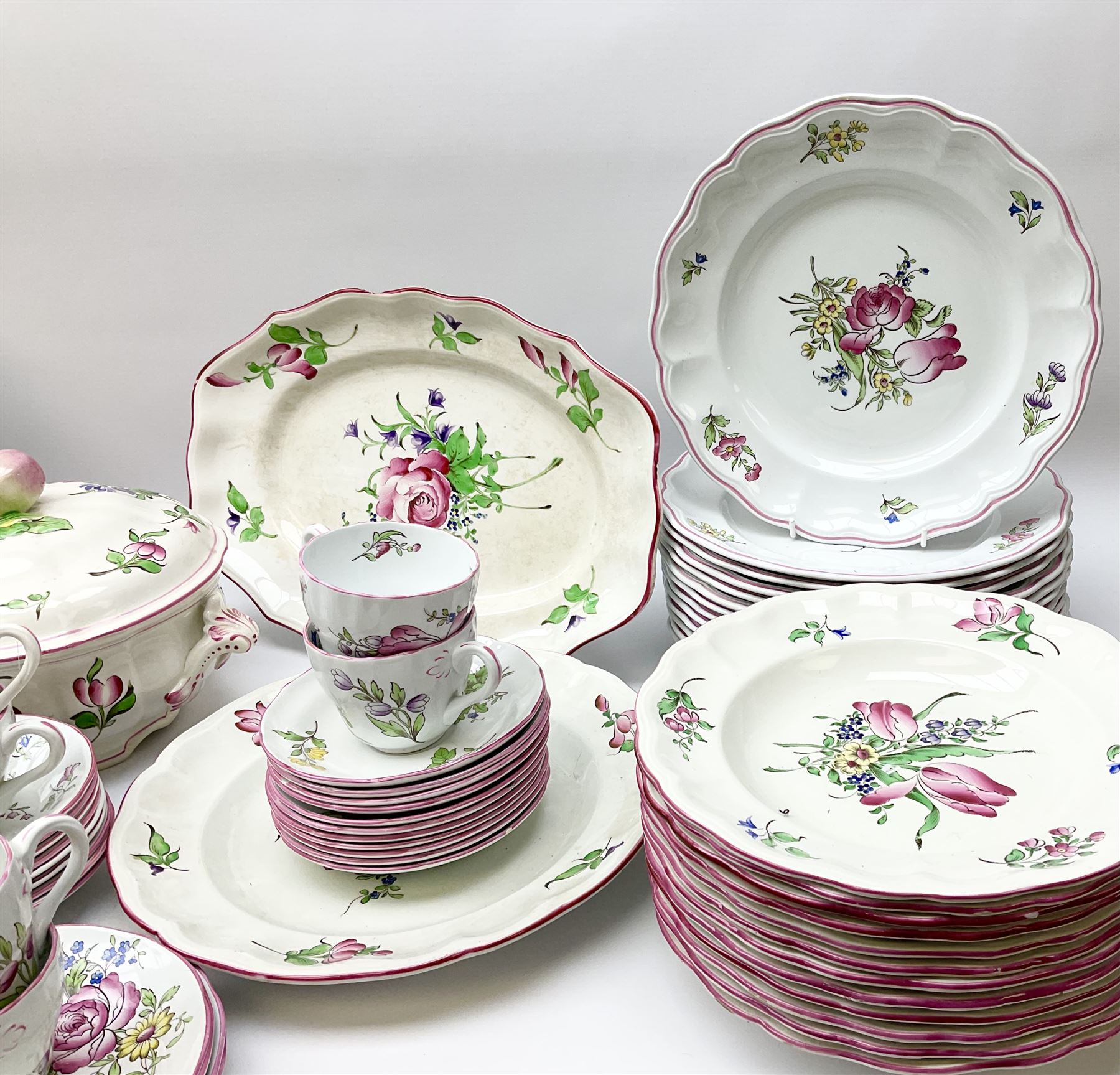 Matched Copeland Spode, Spode and French Luneville and Marlborough Sprays pattern dinner and tea wares, comprising two tureen and covers and apple finials, two sauce tureen and covers with pear finials and fixed stands, six graduated platters including two pairs, large plate, thirteen dinner plates, twelve bowls, ten smaller bowls, eight side plates, eleven smaller side plates, teapot, twin handled sucrier and cover with apple finial, open sucrier, cream jug, smaller cream jug, four breakfast cups, eight tea cups, four large saucers, eleven smaller saucers, and nine further smaller saucers. 