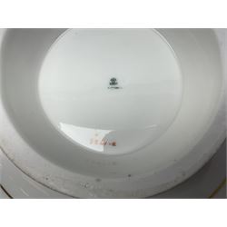 Victorian Copeland, Botanical dessert service, decorated with floral sprigs to the centre with a pink and gilt border, comprising five comports and seven plates, largest comport H20cm, plate D22cm