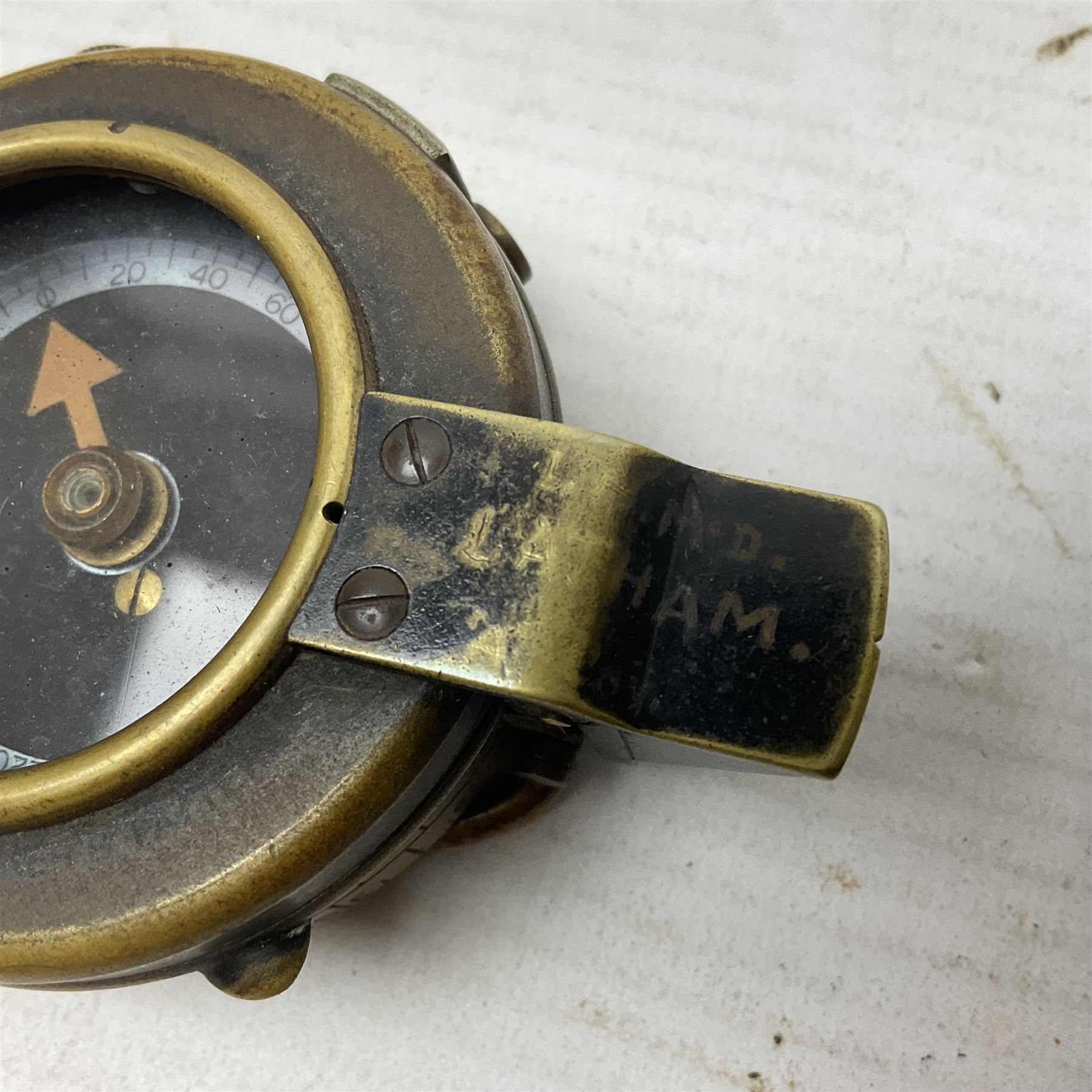 Broadhurst Clarkson brass and leather 4-draw telescope, the first draw with graduations, sliding lens shroud and leather covers for both ends on shoulder strap; marked 'Broadhurst Clarkson & Co. Ltd. 63 Farringdon Road London E.C.', L87cm fully extended; together with a WWI brass marching compass marked F-L No.123113 1918 (broad arrow); crudely etched L.H. McD. Latham; in associated Brooks & Co. leather case dated 1913 stamped W.B. Constable (2)