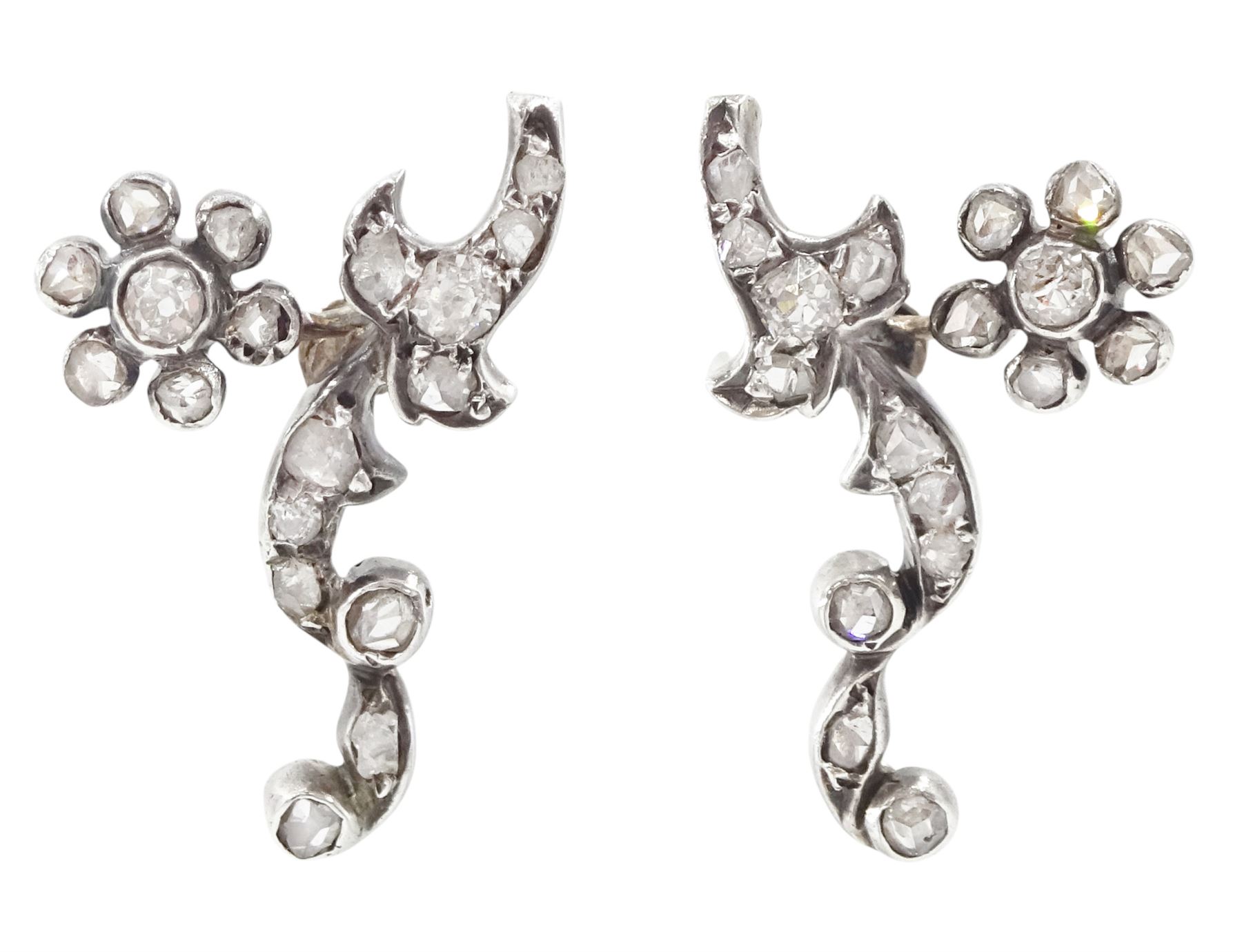 Pair of early 20th century 9ct gold and silver, old cut and rose cut diamond foliate stud earrings