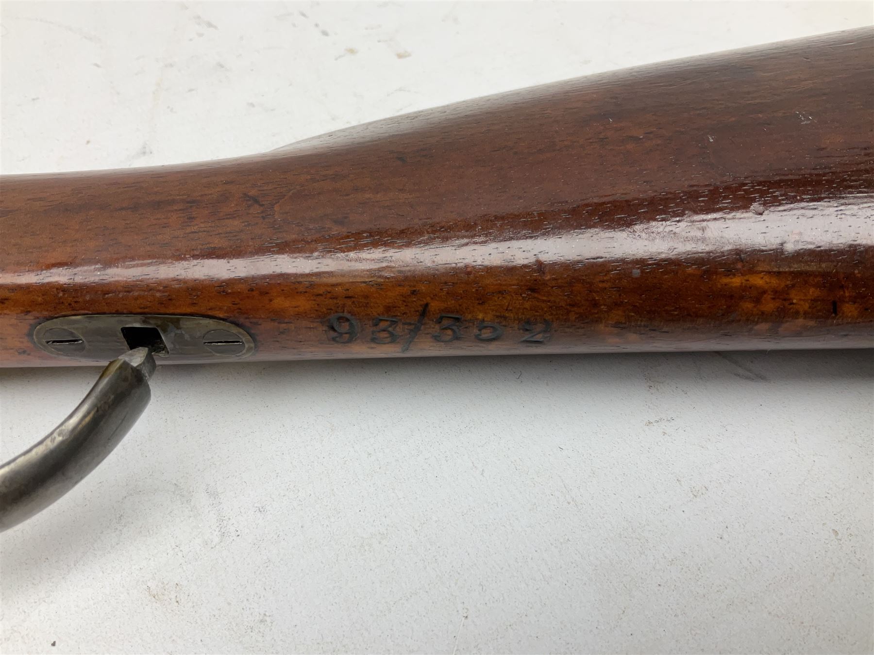 Westley Richards .310 Cadet Martini action rifle, the 63.5cm smooth bored barrel with one barrel band, walnut stock stamped 93/352 with hinged compartment to butt, serial no.3365, L103cm