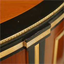 Colombo Mobili - Pair of Italian designer cherrywood art-deco inspired demi-lune commode cabinets, the shaped top with ebonised inlay and gilt brass repeating anthemion beading above a gilt brass reeded moulding, over three long drawers with gilt brass geometric panel mounts, flanked by cupboard doors with diamond motif, raised on tapering square supports 