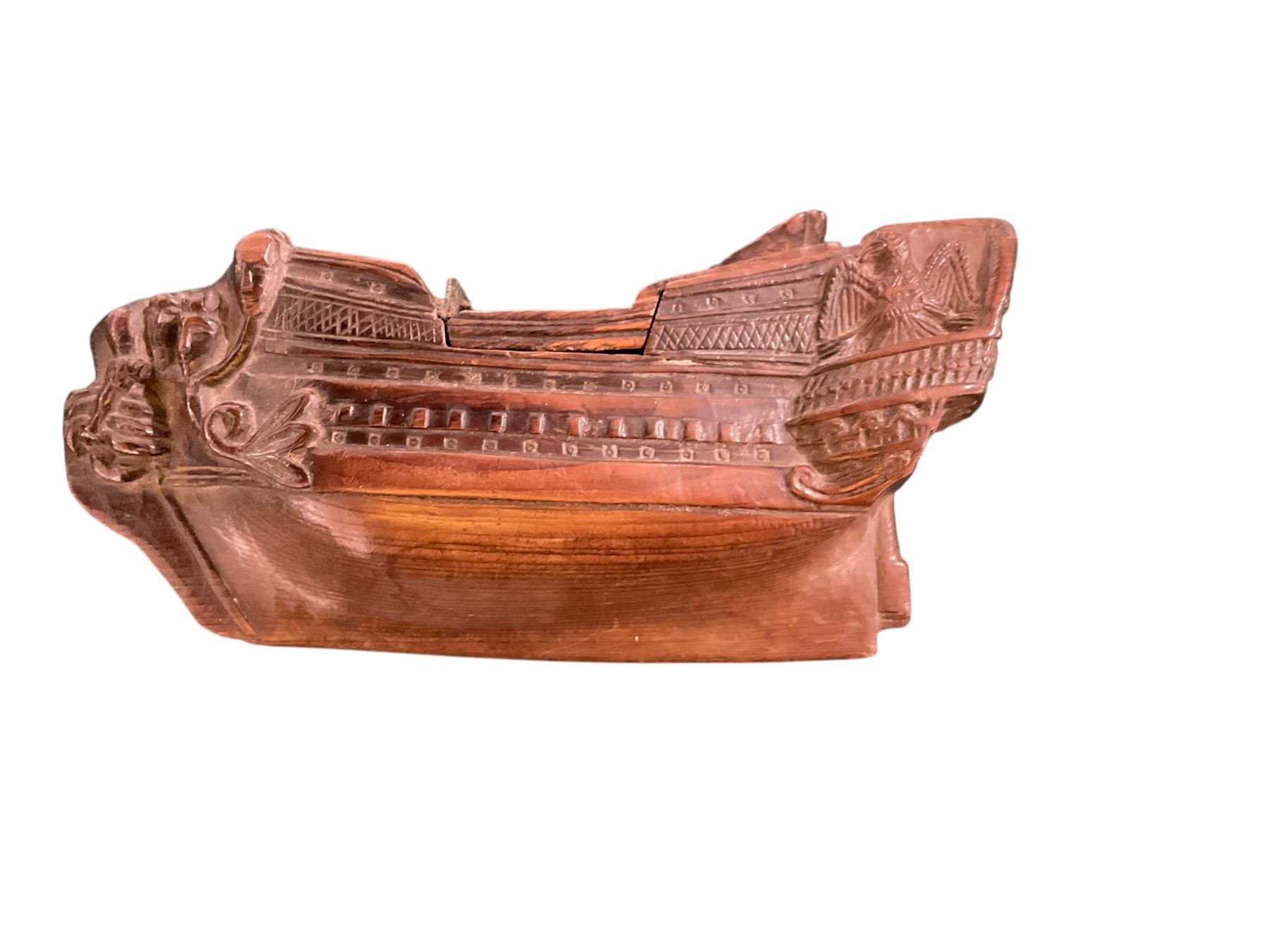 19th century treen snuff box in the form of a ship, with carved detail including windows and mythical figures, L15cm, H6cm