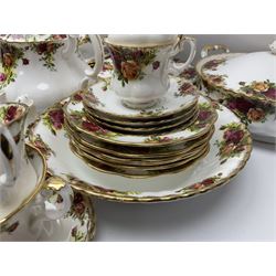 Royal Albert Old Country Roses pattern tea and dinner wares, comprising teapot, coffee pot, milk jug, sugar bowl, six teacups and saucers, cake stand, serving bowl, twin handled tureen, platter, six dinner plates, six side plates, four twin handled soup bowls, sauce boat etc (71)