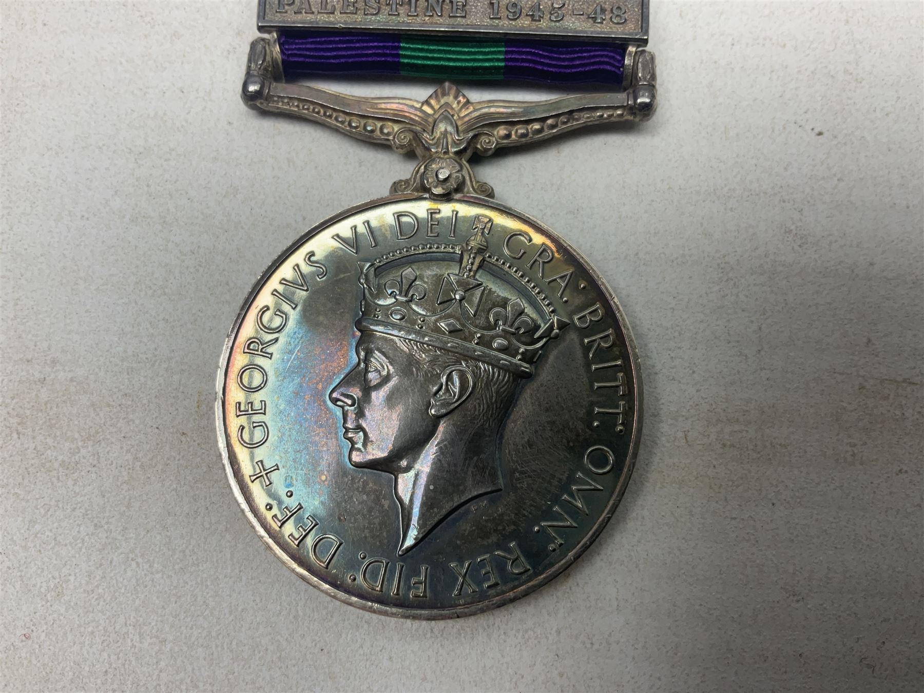 George VI General Service Medal with Palestine 1945-48 clasp awarded to 19117460 Pte. P. Tilmouth R. Lincolns; with ribbon