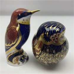 Four Royal Crown Derby paperweights, comprising Owl, Bee-eater, Song Thrush, and White Pelican all with gold stoppers 