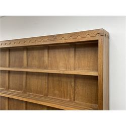 'Mouseman' adzed oak dresser, raised three heights plate rack, six drawers and two cupboards, carved with mouse signature, by Robert Thompson of Kilburn