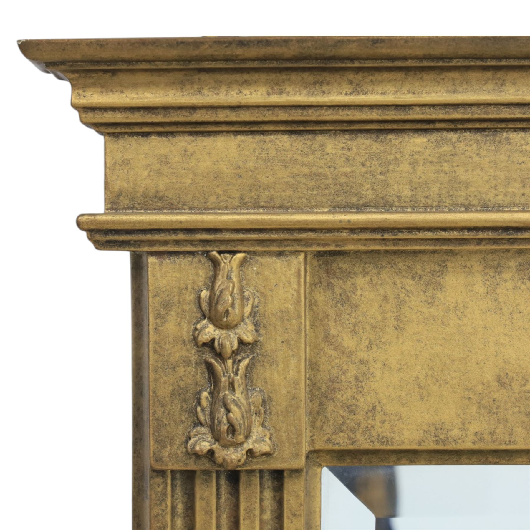 Late 20th century neoclassical style gilt wall mirror, the moulded cornice above a plain frieze centred with foliate mount, fluted pilaster sides with applied ornament, on moulded plinth base surrounding a rectangular mirror plate