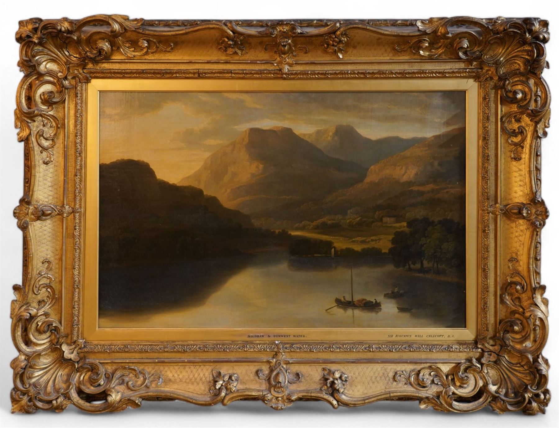 Sir Augustus Wall Callcott (British 1779-1844): 'Skiddaw and Derwent Water', oil on canvas inscribed and titled on the mount 66cm x 100cm, in 19th century gilt and gesso swept ornate frame with scrolling scalloped shell motifs
