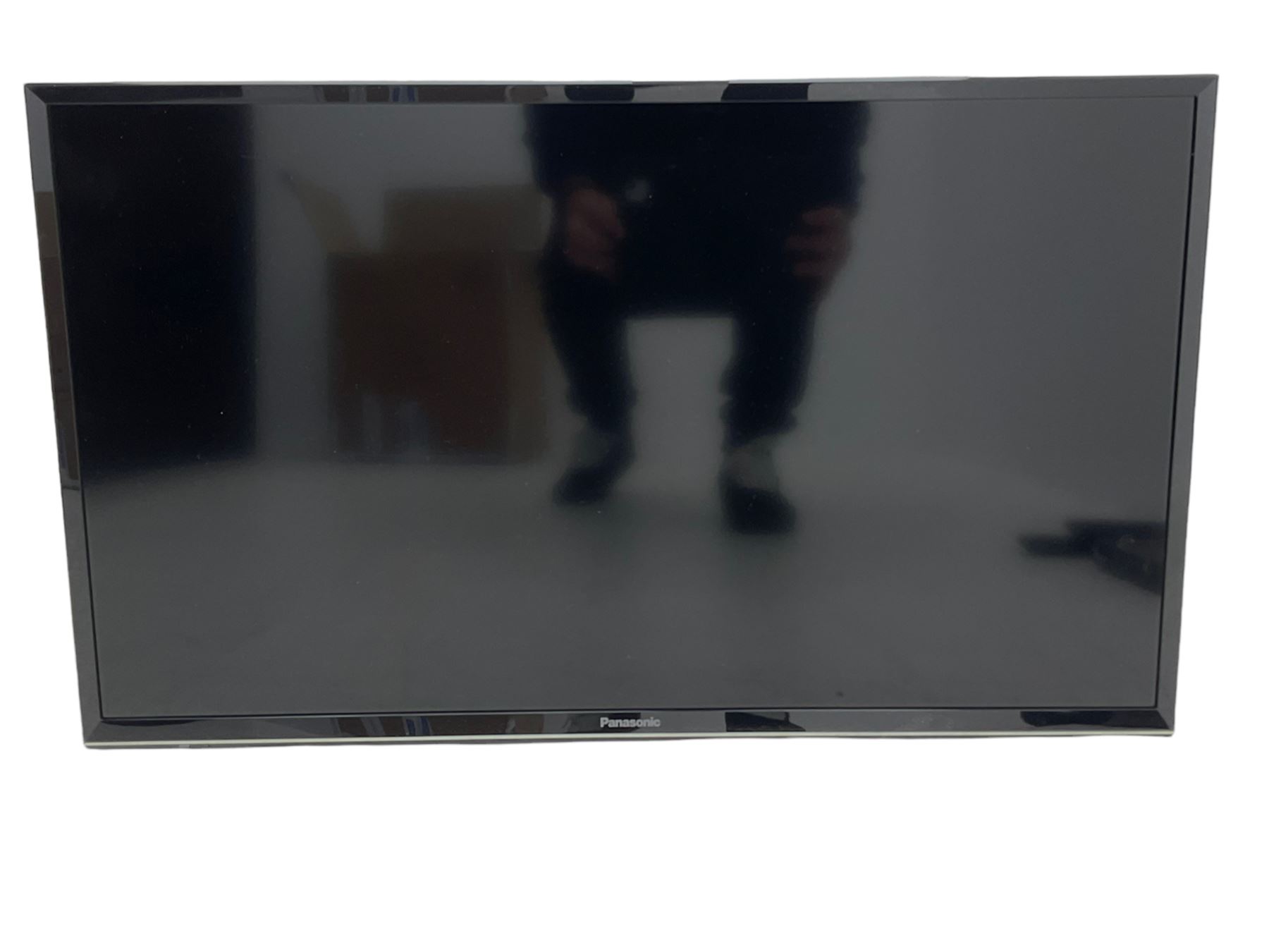 Panasonic 32 inch TV with DVD player and wall bracket and CD rack including various CDs 