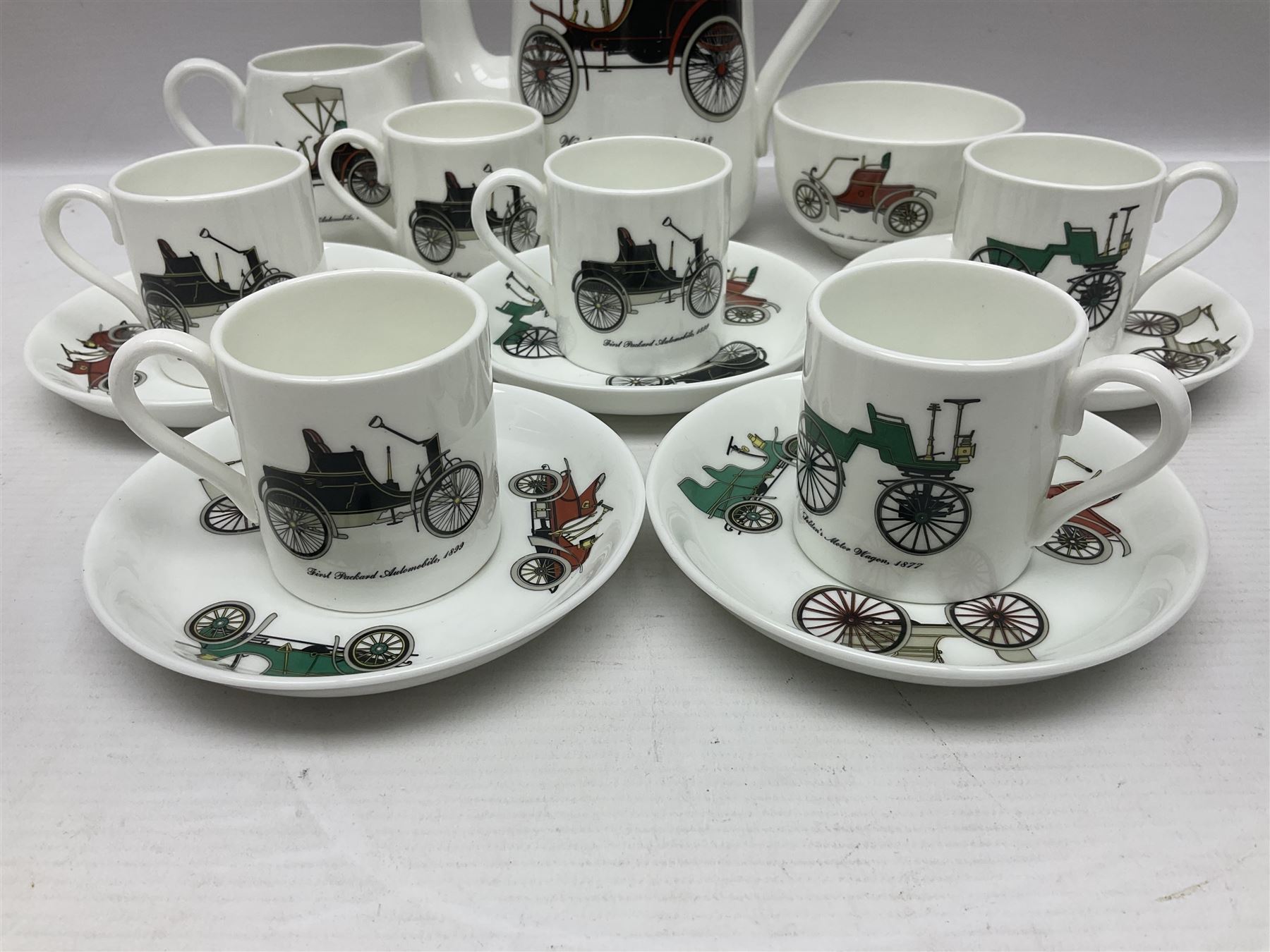 Crown Staffordshire coffee service for six, decorated with motor cars 