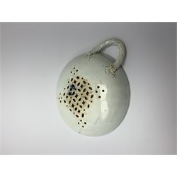 Late 18th/early 19th century Leeds Pottery egg drainer, the pierced bowl of circular form decorated with blue transfer printed floral spray and floral border, the twisted handle with foliate mounts, bowl D9cm