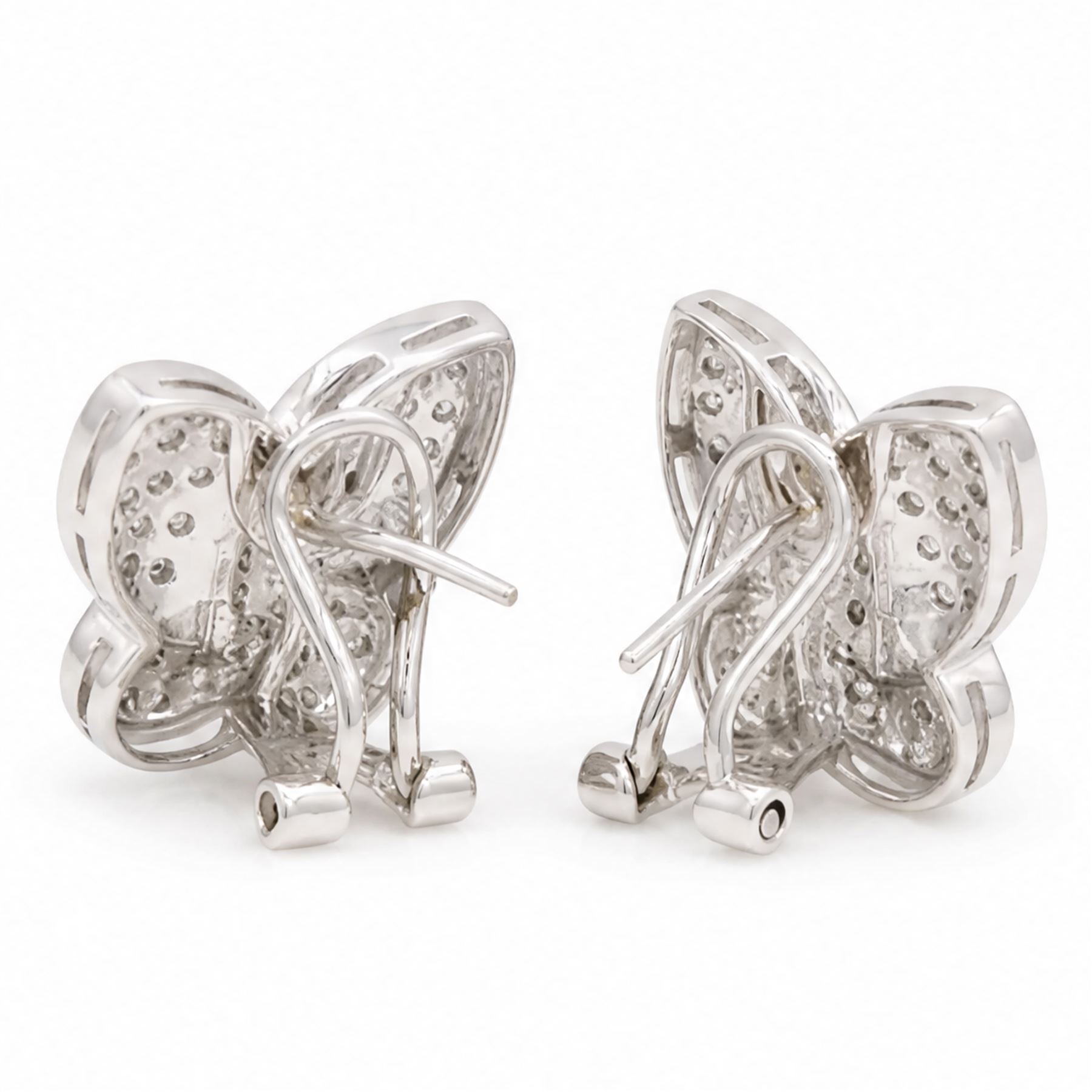 Pair of 18ct white gold diamond butterfly earrings, each stud pave set with single cut diamonds, stamped 750