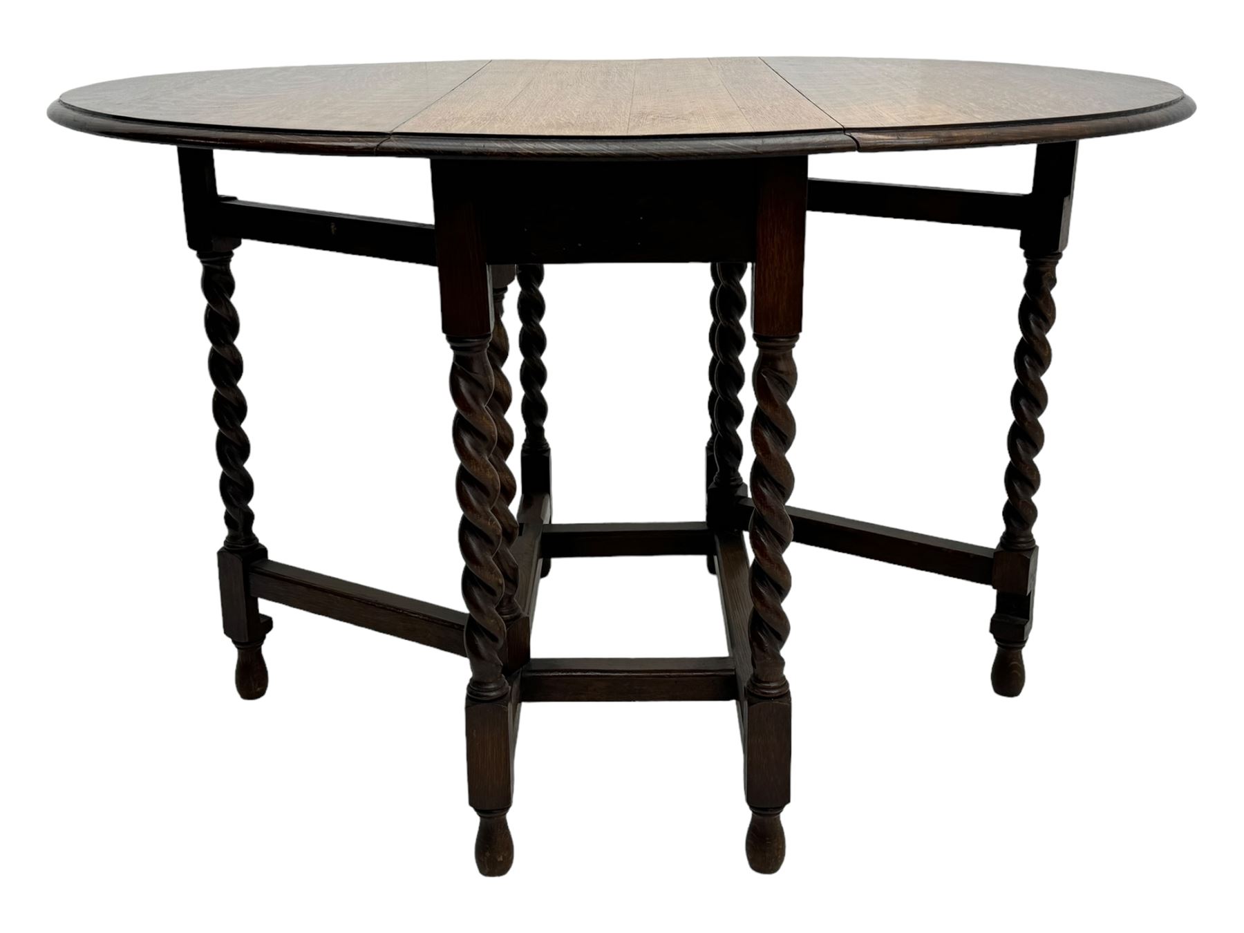 Early 20th century oak gateleg table, oval top with drop leaves supported by barley twist swing supports, united by plain stretchers, on turned feet (W119cm, D92cm, H77cm);
