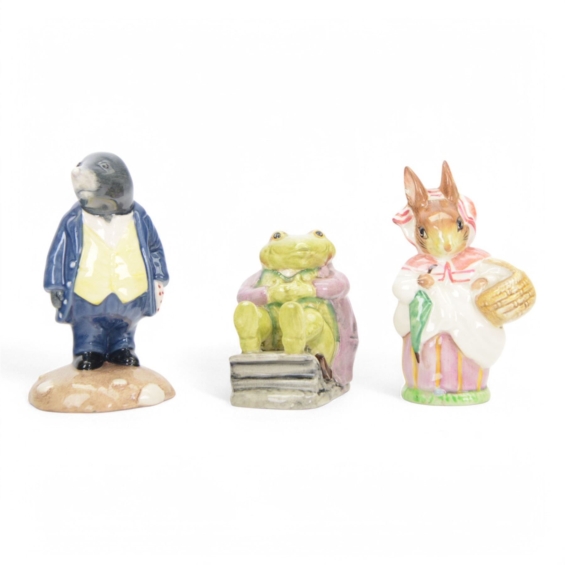 Seventeen Beswick figures, including Wind in the Willow figures; Badger, Frog, Mole and Ratty, Beatrix Potter figures; Sir Issac Newton, Mr Jackson, Mr Jeremy Fisher etc 