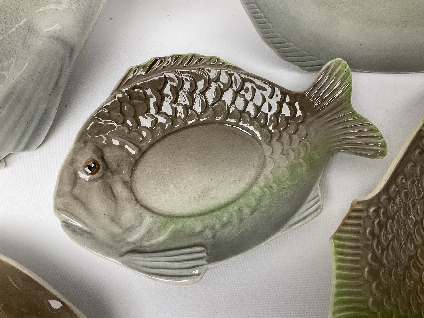 Shorter & Son six fish plates, together with a larger platter and sauce boat and saucer, all with stamped marks beneath