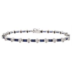 18ct white gold sapphire and diamond bracelet, twenty-two baguette cut sapphires, each separated by two round brilliant cut diamonds, hallmarked