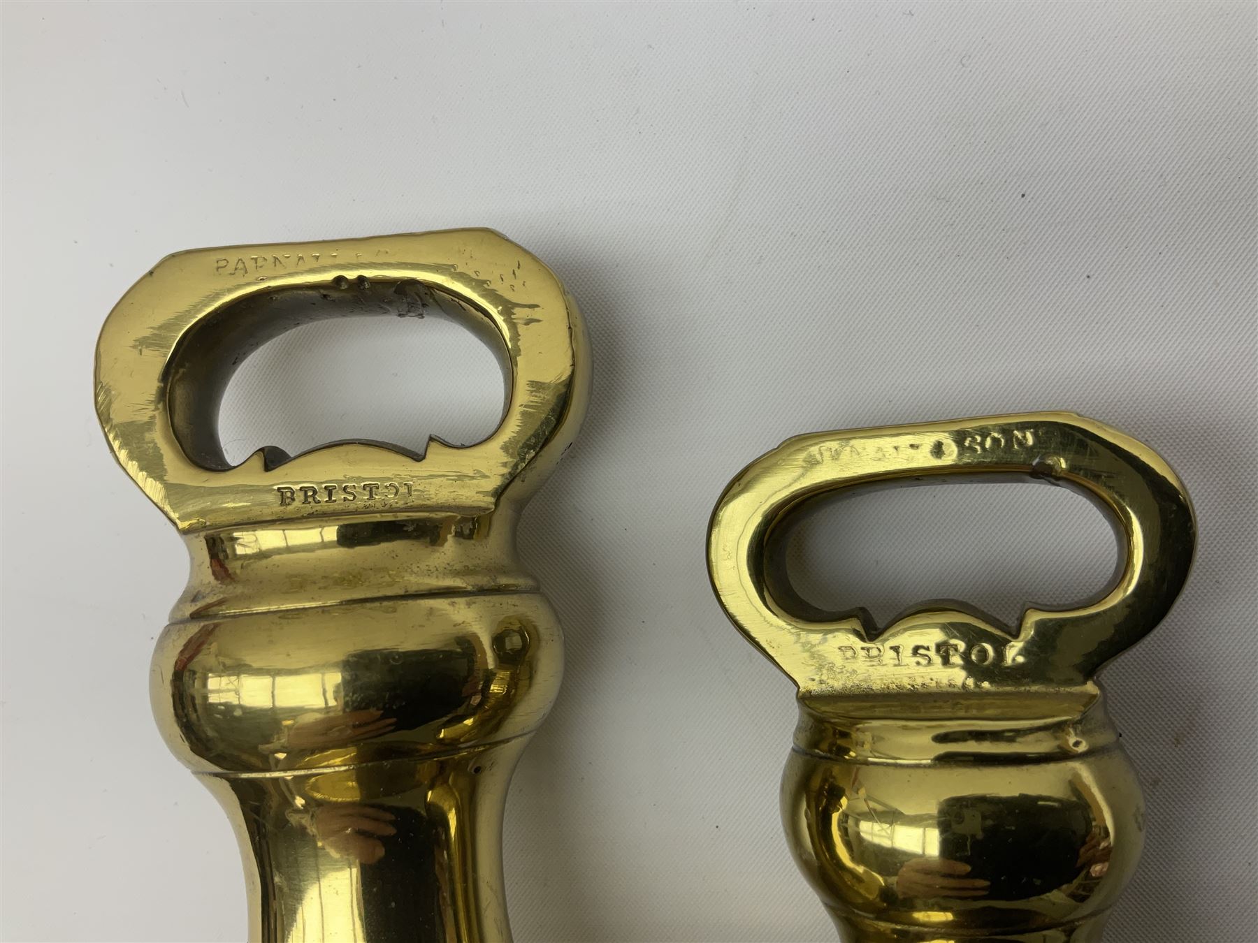 Graduated set of eight brass bell weights, together with a set of five graduating weights (13)