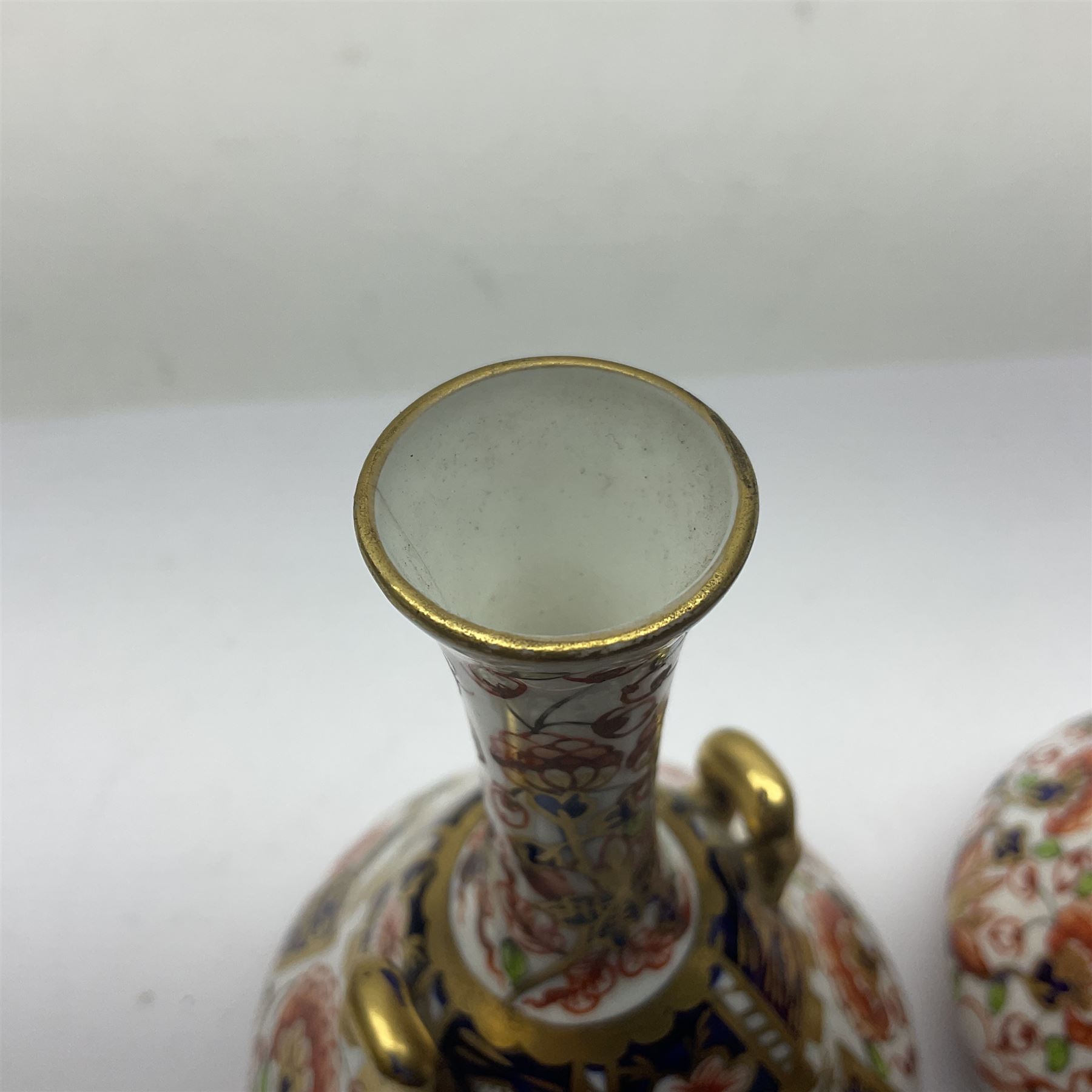 Pair of Royal Crown Derby 6299 imari pattern miniature vases, together with a miniature pitcher and dish in 2451 imari pattern, all with printed marks beneath, vase H12cm 