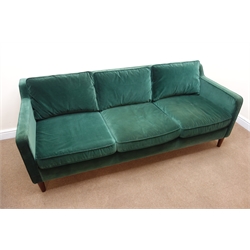  Barker and Stonehouse three seat sofa, upholstered in an emerald velvet, turned tapering supports (W205cm) and matching armchair (W74cm)  