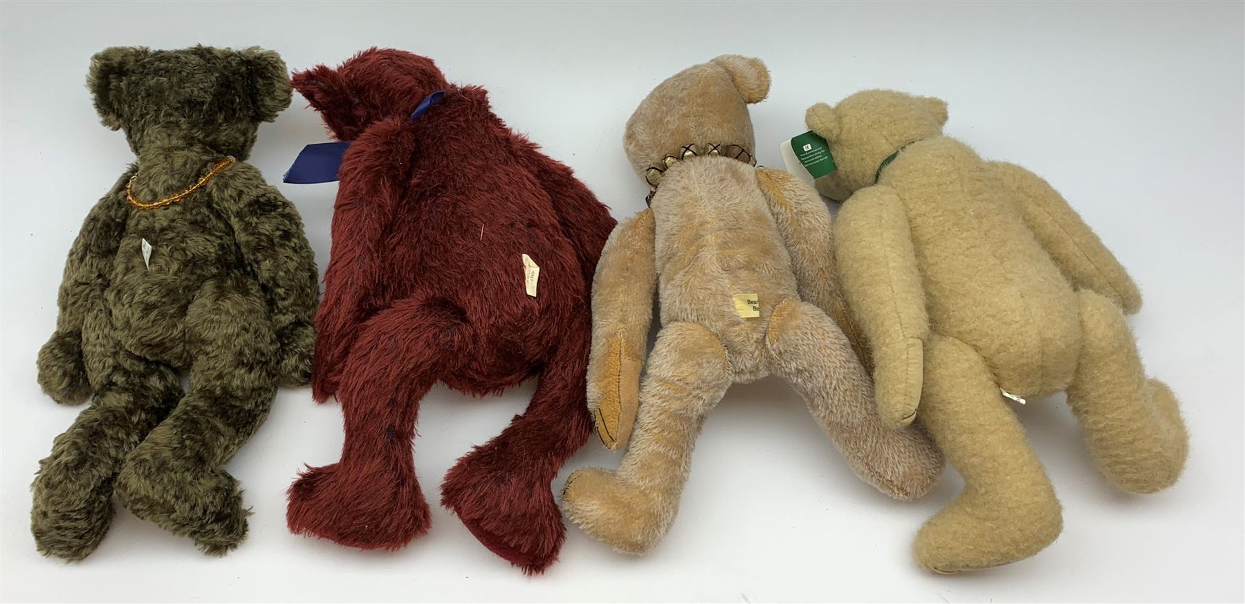 'Mitchell' - limited edition teddy bear by Deborah Beardsley Elertson of Beardsley Bears No.6/15 with tag certificate; 'Harold' limited edition bear by Pam Howells of Mayfair Arts Limited No.A0318; handmade maroon bear by Horsforth Bears; and another B.J. Bears handmade bear by Crown Artist Bears (4)