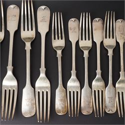 Silver Fiddle pattern canteen, composite, largely Victorian, comprising twelve table spoons, twelve table forks, twelve dessert spoons, eleven dessert forks, one soup ladle, one sauce ladle, and one serving spoon, each terminal engraved with The Everitt family Griffin crest, largely hallmarked Francis Higgins III, London 1892, soup and sauce ladle dated 1808 and 1828 

Provenance: From the collection of Andrew Chichester Everitt.



