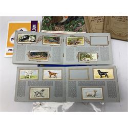 Collection of cigarette cards and other ephemera, to include W.D & H.O Wills albums wild flowers, dogs, the sea-shore etc 