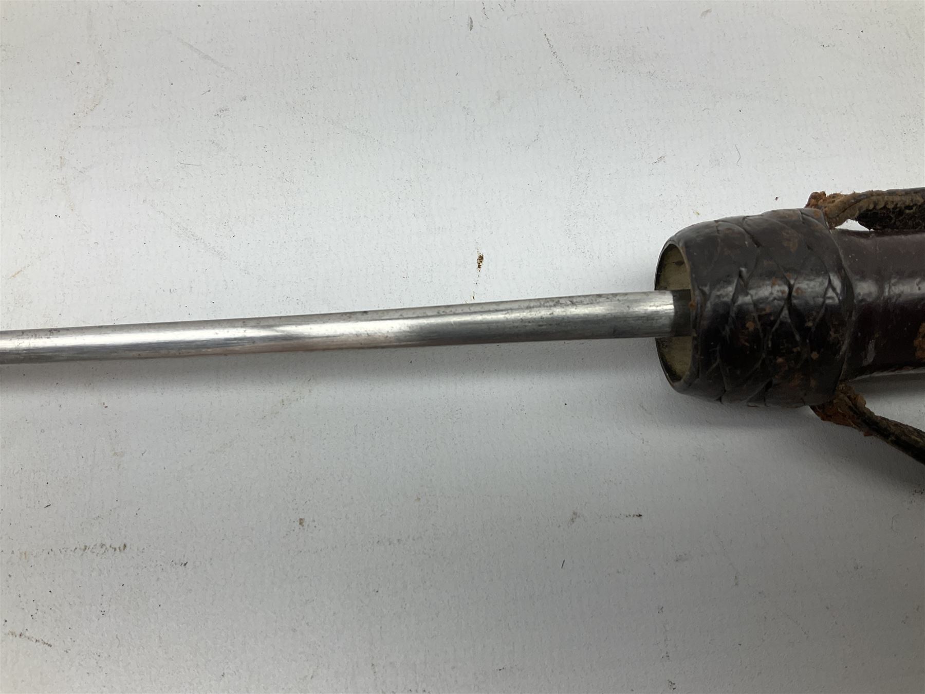 Early 20th century officer's swagger type leather covered sword stick, the 33cm etched single fullered blade marked Wilkinson Pall Mall, with carrying strap L60.5cm