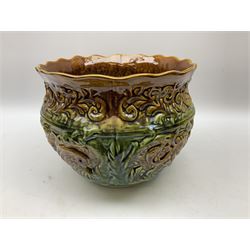 Green and brown majolica jardinière on stand, together with three other jardinieres of similar form, jardiniere on stand H84cm
