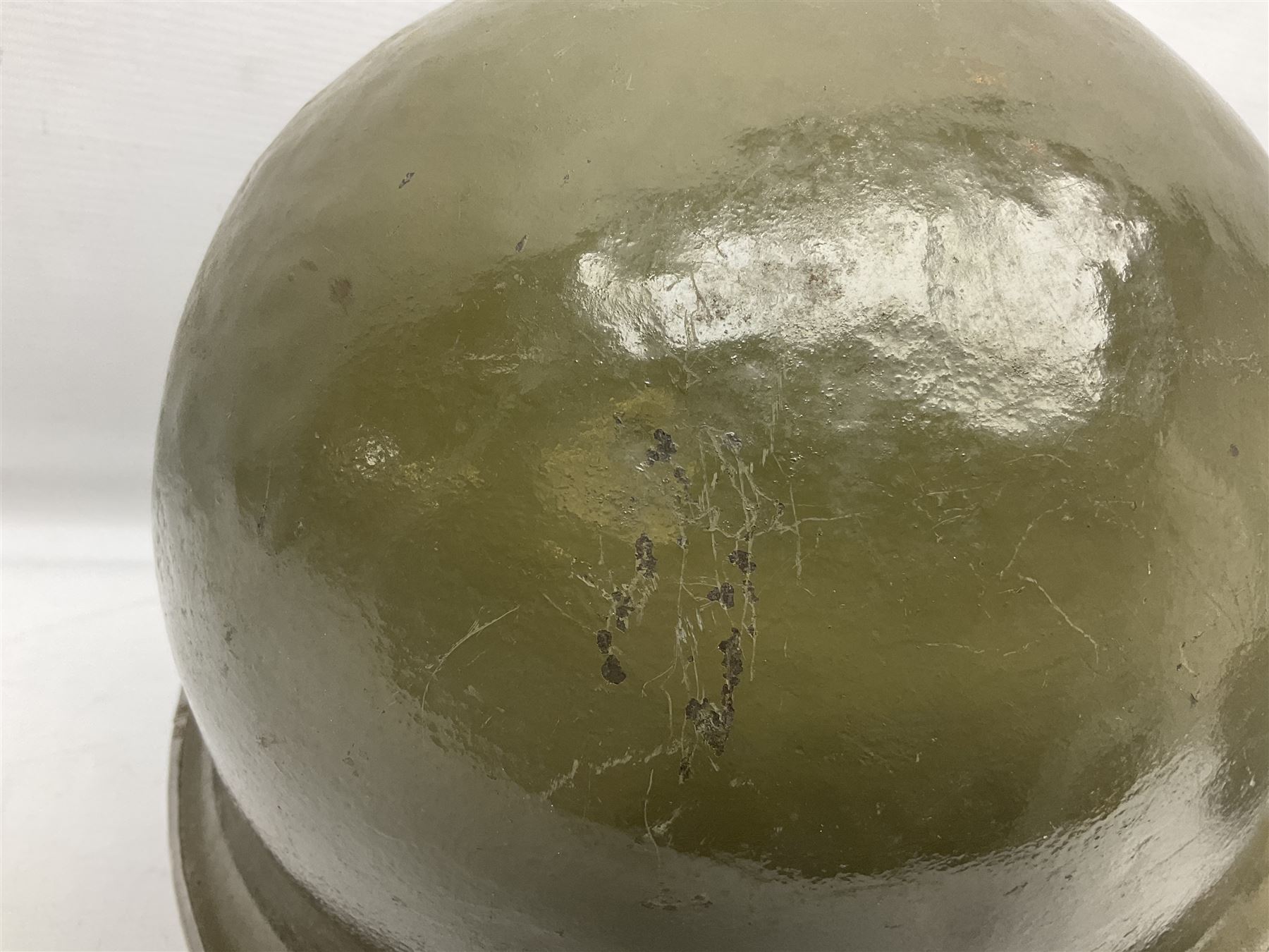 1950s French Algerian War steel helmet with liner; indistinctly marked 'S.I.A. LE EANS(?) 71R'