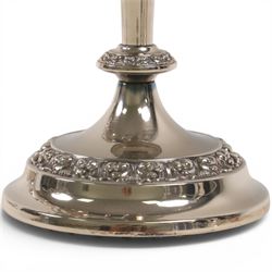 Silver plate two branch candelabra with grape vine decoration to the base, together with a matching pair of candle sticks and other candlesticks  