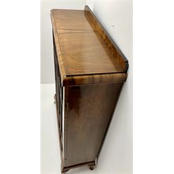 Early 20th walnut bookcase, raised shaped back, two glazed doors enclosing three shelves, cabriole feet