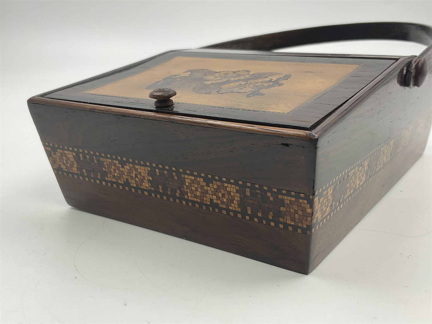 19th century rosewood Tunbridge Ware basket, of rectangular form with curved bentwood handle, and twin hinged sloping covers, lifting to reveal paper lined interiors, not including handle H5.5cm D10.5cm L18cm