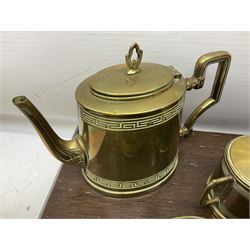 Brass tea set, comprising teapot, milk jug and covered sucrier with a meander pattern, together with another similar tea pot and covered sucrier, a part cased canteen etc
