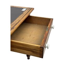 Victorian pine writing table, rectangular top with moulded edge and inset leather writing surface, the frieze fitted with two short drawers, raised by turned supports 