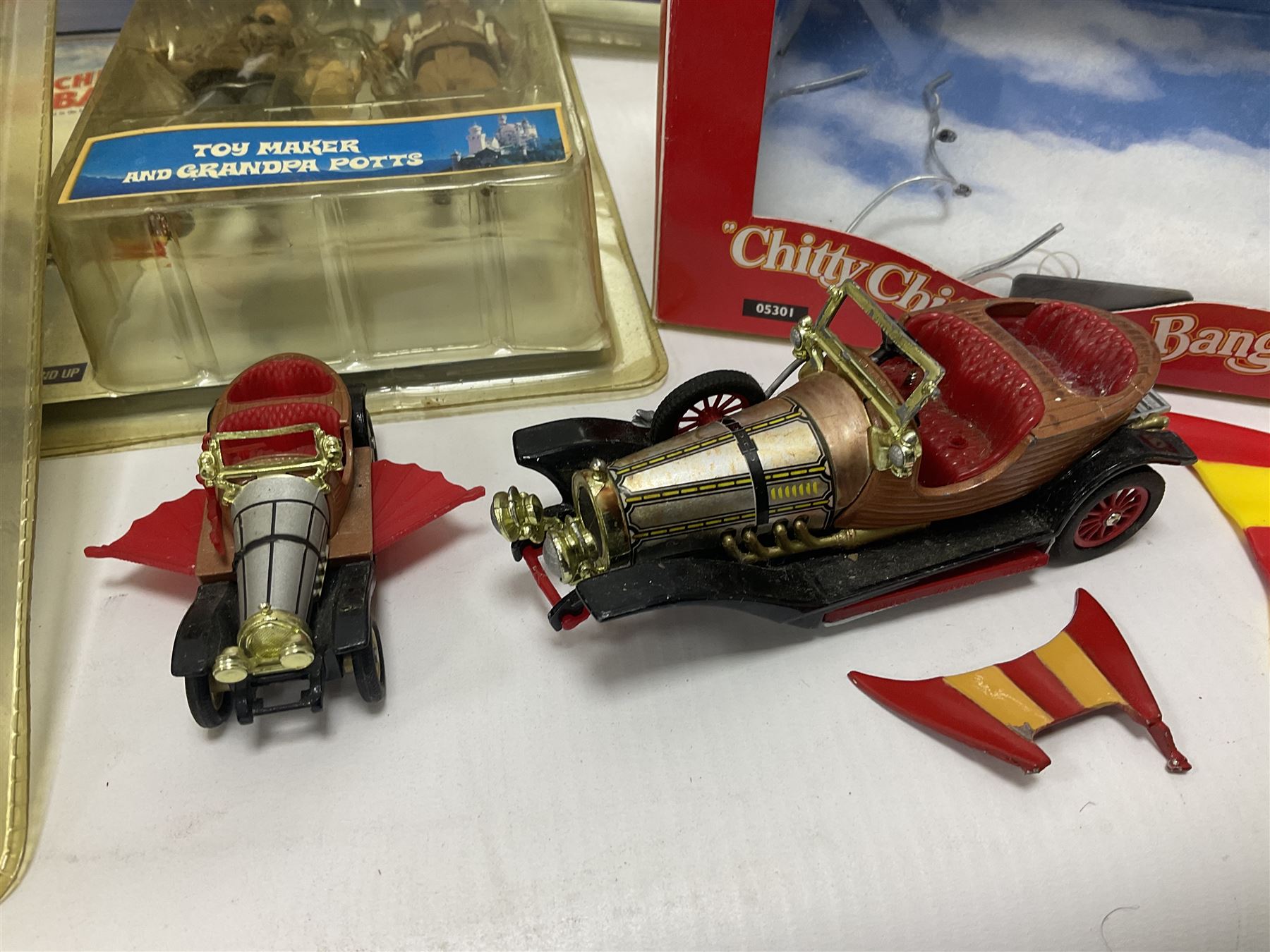 Collection of Chitty Chitty Bang Bang figures and model cars both loose and boxed, to include ‘Truly Scrumptious and Jeremy’ blister pack signed by Adrian Hall