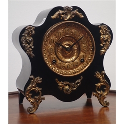  19th century cartouche shaped mantle clock, ebonised case with gilt metal leaf mounts, 'Ansonia Clock Co.' twin train movement, H25cm  