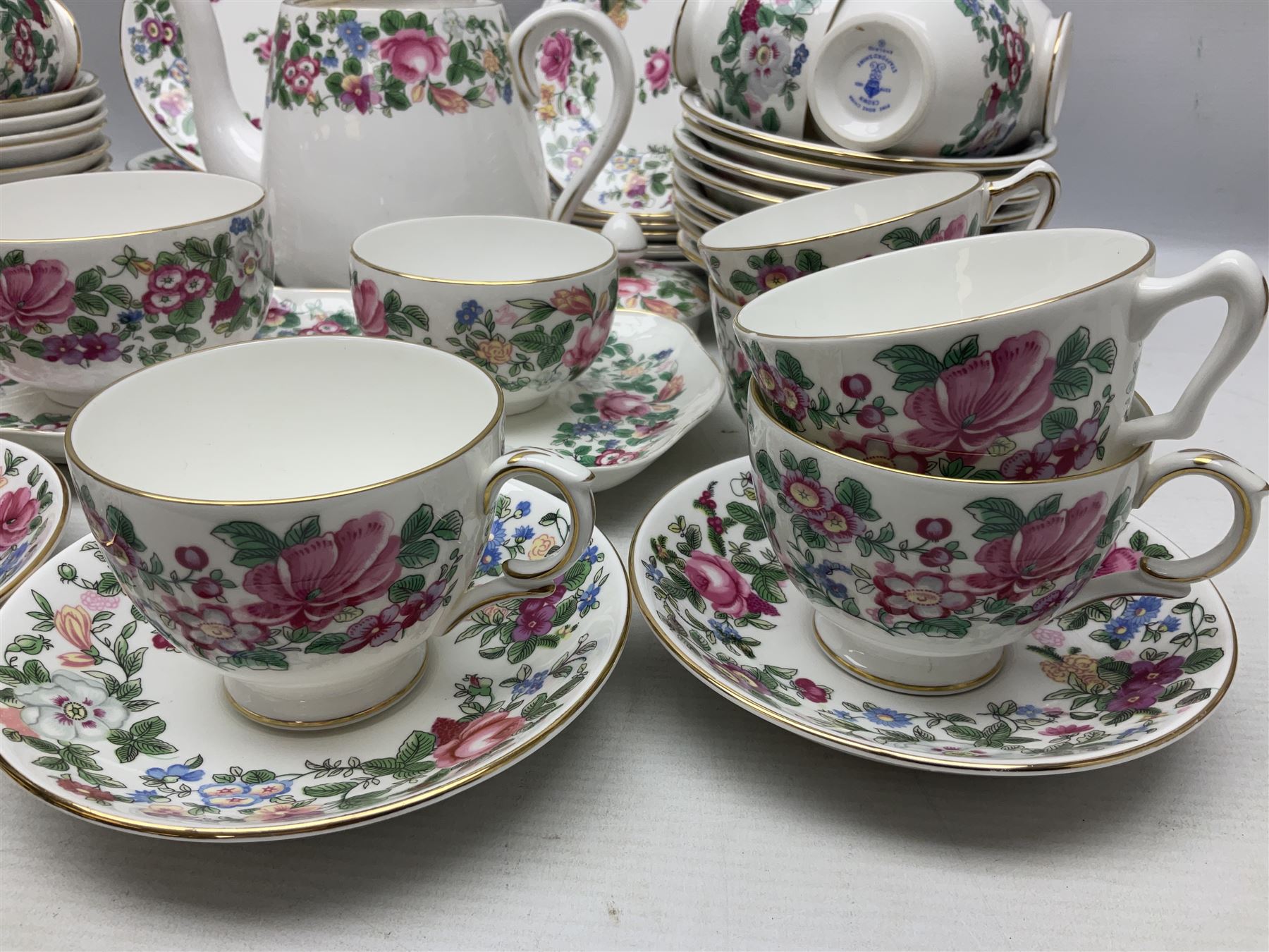 Crown Staffordshire Thousand Flowers pattern part tea service, to include teapot, two open sucriers, eighteen cups, fifteen saucers etc (57)